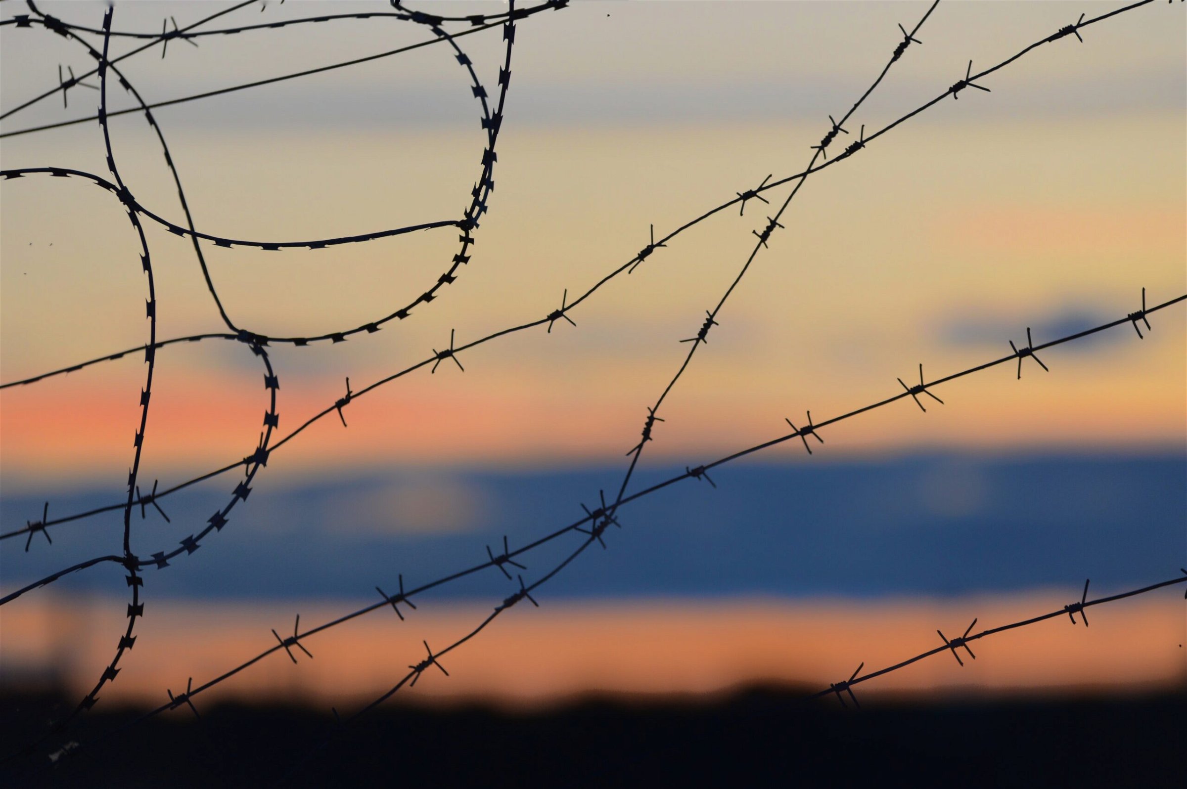 Image of barbed wire - Destination Certification
